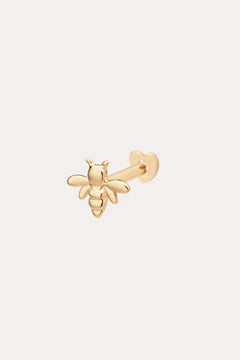 The 14K Solid Yellow Gold Busy Bee Flat Back Stud features detailed wings and body, a straight post, and a heart-shaped flat back, displayed on a plain light background.