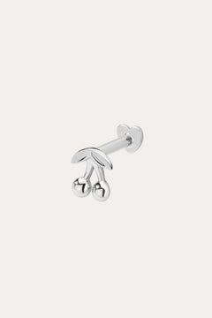 The 14K Solid White Gold Cherry Flat Back Stud, featuring two round cherry fruits and delicate leaves, stands out as elegant body jewelry against a plain light background.