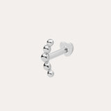 The 14K Solid White Gold Curved Ball Flat Back Stud features six shiny round beads in a curved line, shown on a plain white background—an elegant choice for body jewellery.