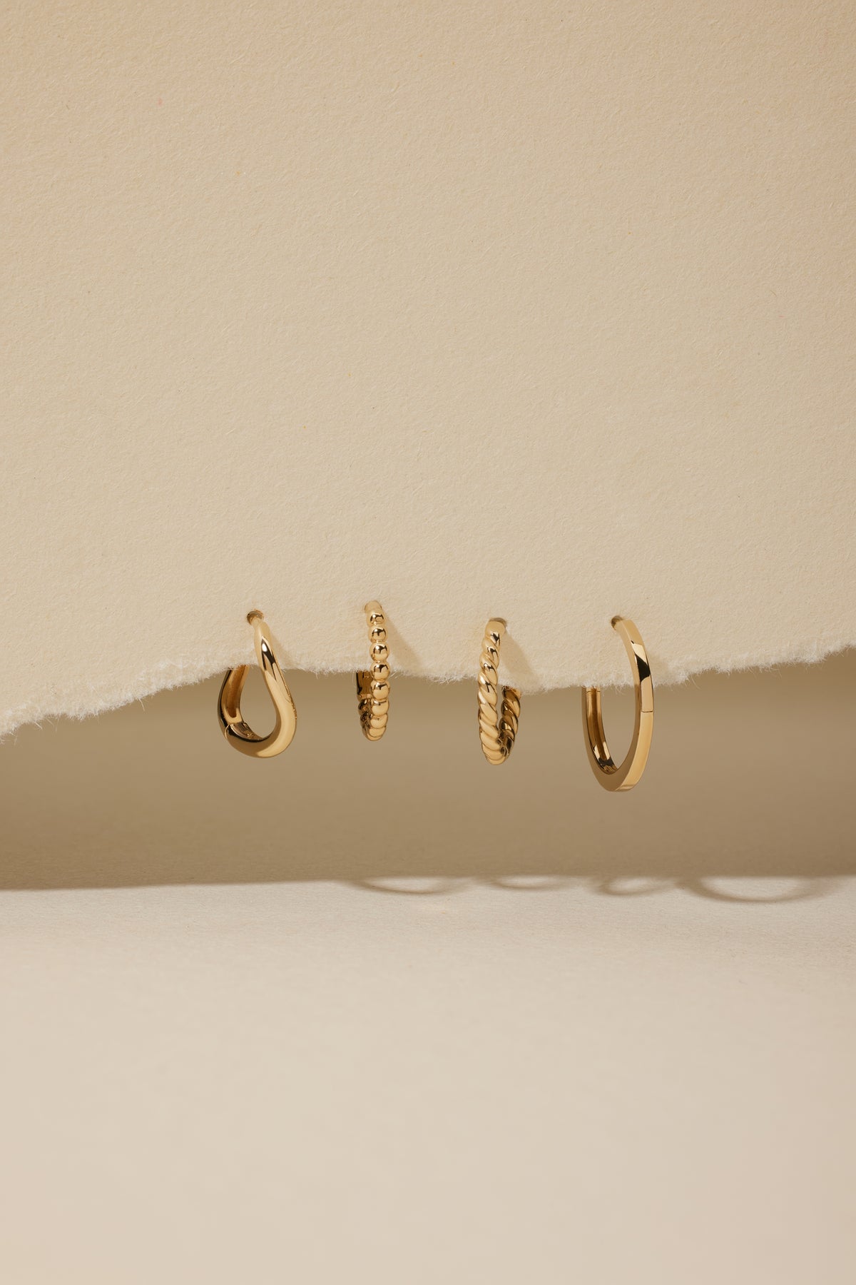 Solid Gold Huggie Collection