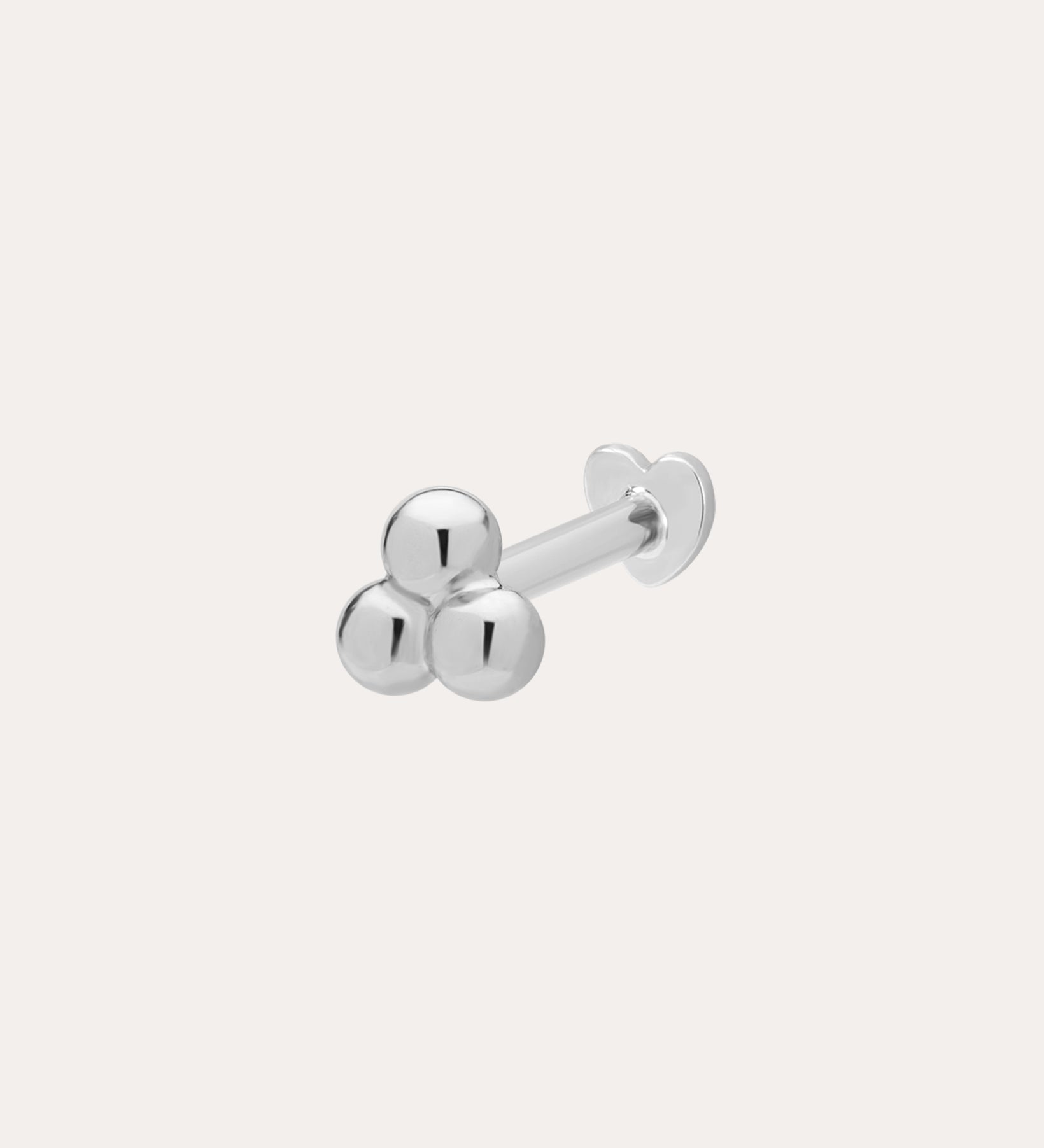 The 14K Solid White Gold Trinity Flat Back Stud features three small round beads in 14K white gold, with a straight post and flat backing for secure, stylish body jewelry.