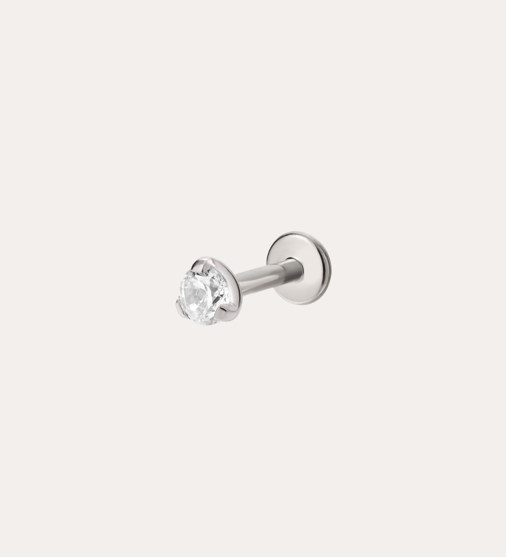 A 3mm Martini Set threadless flat back cartilage stud earring in gold titanium, featuring a single round clear gemstone, displayed against a plain white background.
