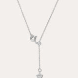 The Mabel Sculptural Droplet Pendant Necklace in Silver features an adjustable chain, a sculptural droplet-shaped pendant, and a simple spring ring clasp with an extended drop chain detail.
