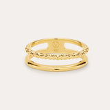 The Molten Double Band Ring in Gold, crafted in 18k gold plated with smooth and twisted rope bands, is elegantly displayed against a light background.