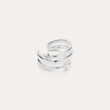 The Star Crystal Ear Cuff in sterling silver features a modern, double-band design with a single round gemstone, inspired by celestial jewelry, displayed against a plain white background.
