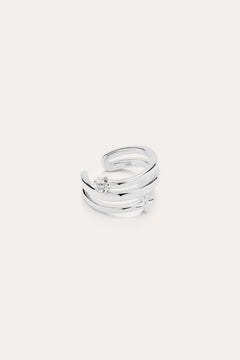The Star Crystal Ear Cuff in sterling silver features a modern, double-band design with a single round gemstone, inspired by celestial jewelry, displayed against a plain white background.