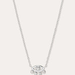 The Defender Evil Eye Necklace in Sterling Silver features an eye-shaped pendant with a central gemstone and four dangling gems, combining elegance and protective charm, shown against a plain white background.