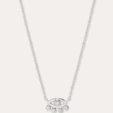 The Defender Evil Eye Necklace in Sterling Silver features an eye-shaped pendant with a central gemstone and four dangling gems, combining elegance and protective charm, shown against a plain white background.