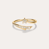 The Crystal Shooting Star Open Ring in Gold features a star-shaped design adorned with small white gemstones on both the band and the star, crafted in 14K gold plated finish. Set against a plain light background, this adjustable ring offers a comfortable fit.