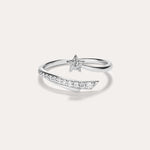 Introducing the Crystal Shooting Star Open Ring in Silver—a sterling silver adjustable ring with a wraparound design, showcasing a small star embellished with clear gemstones and a partially encrusted band of sparkling stones, evoking the delicate beauty of a crystal shooting star.