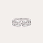 The Crystal Link Ring in Sterling Silver showcases a geometric, open link design adorned with clear cubic zirconia gemstones on each segment, presented against a minimalistic light background.