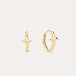 The 14K Recycled Solid Yellow Gold Star Huggie Earring features a polished star design in 14K yellow gold, perfect for your celestial ear stack. Shown against a plain, light background.