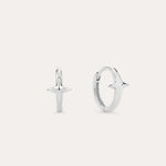 A pair of 14K Recycled Solid White Gold Star Huggie Earrings, each with a four-pointed star charm, shown against a plain light background.