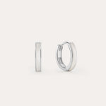 The Mother of Pearl Huggies in Sterling Silver are shown against a white background, with one earring front-facing and the other from the side—lightweight hoops ideal for daily wear or stacking with your favourite jewellery.