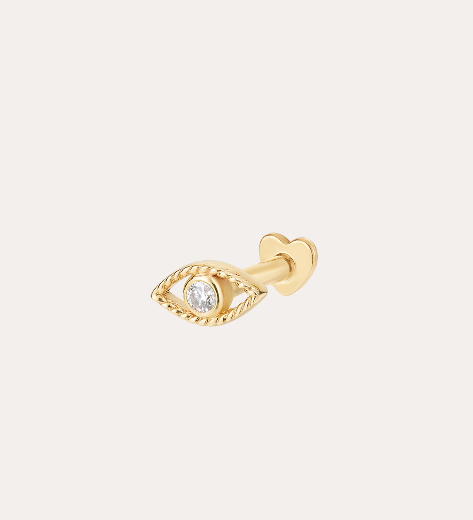 The 14K Solid Yellow Gold Lab-Grown Diamond Evil Eye Flat Back Stud features a twisted border, a central lab-grown diamond, and a heart-shaped backing. Displayed against a plain, light-colored background.