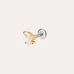 Introducing the Double Marquise Threadless Flat Back Titanium Cartilage Stud in Gold—crafted in sleek titanium with a luxurious yellow gold PVD finish, this refined piece showcases two clear marquise-cut gems in gold prongs atop a silver post. Designed as a flat back earring, it offers superior comfort and durability, making it the perfect choice for those seeking an elegant cartilage accessory.