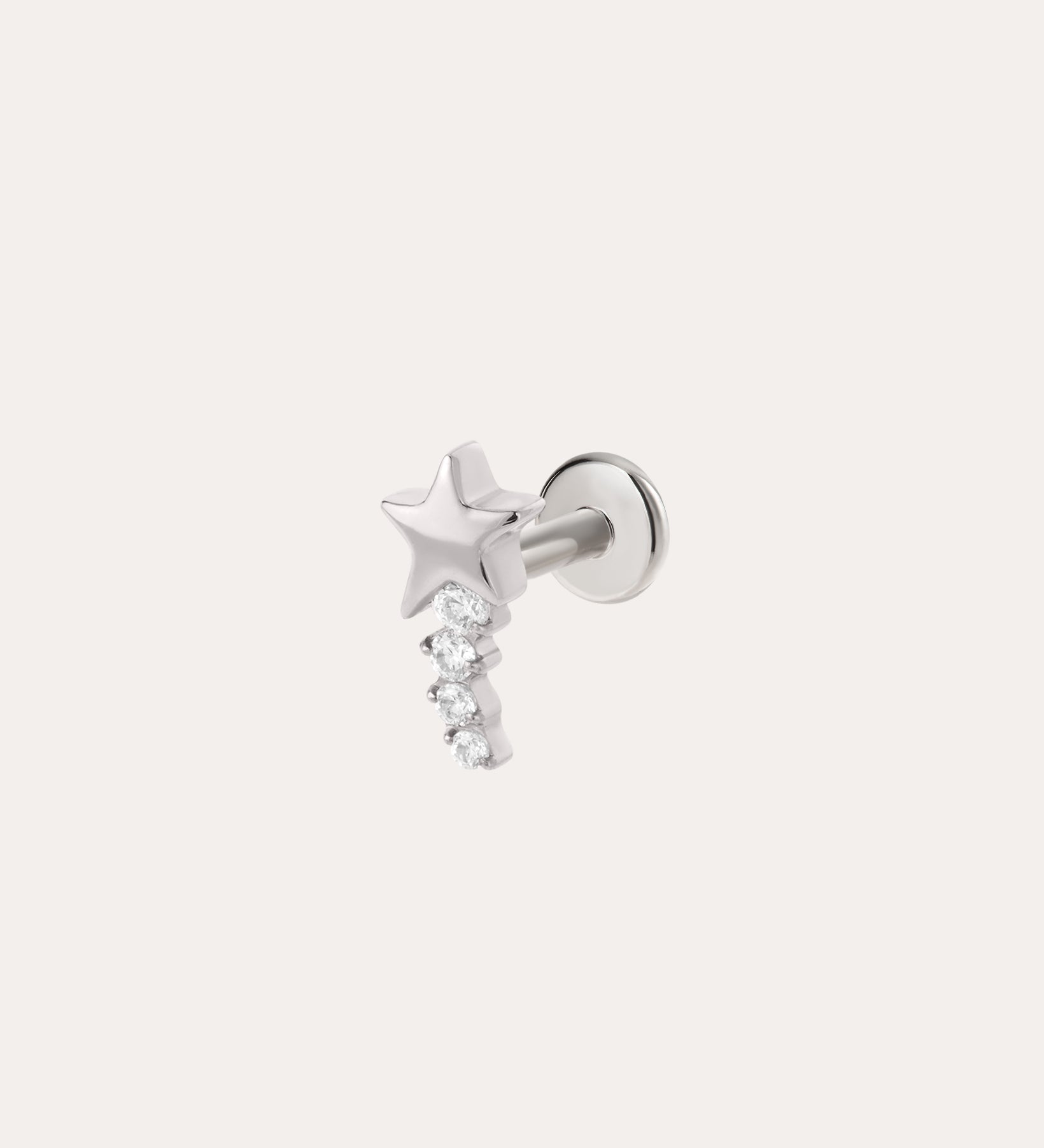 The Crystal Shooting Star Threadless Flat Back Titanium Cartilage Stud in Platinum features a star-shaped stud with three small, round, clear gemstones dangling below it. Shown against a plain white background, this platinum PVD earring offers both style and comfort with its threadless flat back design for your piercing.