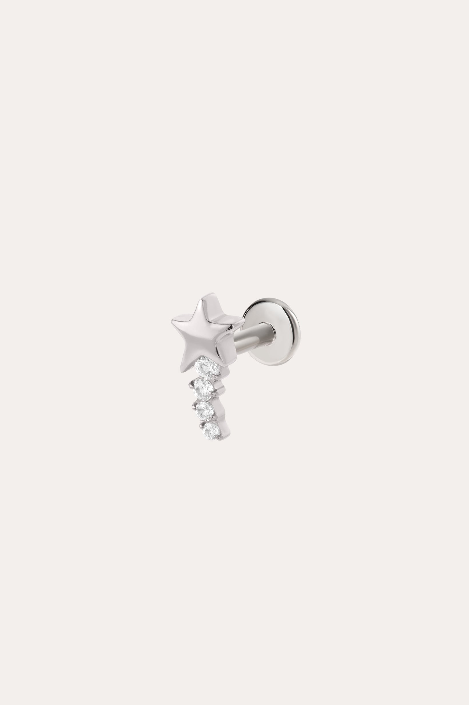 The Crystal Shooting Star Threadless Flat Back Titanium Cartilage Stud in Platinum features a star-shaped stud with three small, round, clear gemstones dangling below it. Shown against a plain white background, this platinum PVD earring offers both style and comfort with its threadless flat back design for your piercing.
