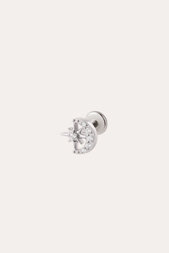 The Celestial Spark Threadless Flat Back Titanium Cartilage Stud in Platinum, featuring a crescent moon and star design accented with small clear gemstones, is shown against a plain light background. This stunning, hypoallergenic earring in platinum PVD ensures comfortable wear with its threadless flat back design.