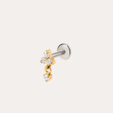The Crystal Dangle Threadless Flat Back Titanium Cartilage Stud in Gold, shown in yellow gold PVD, features a sleek barbell design with a gold star charm and three small clear gemstones. A dangling cluster of gold and crystals adds sparkle, while the threadless flat back ensures comfortable wear. The earring is photographed against a plain white background, highlighting its elegant crystal dangle style.