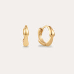 The Colette Droop Link Huggie Earrings in Gold feature smooth, rounded organic curves, showcased against a plain light background.