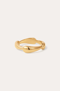 The Colette Link Droop Ring in 18k Gold Plated features a smooth, organic design with gentle curves; displayed on a simple, light background, it’s a refined statement ring for any occasion.