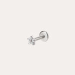 The Crystal Flower Threadless Flat Back Titanium Cartilage Stud in Platinum features a platinum PVD finish and clear gemstones, shown against a simple background—perfect as hypoallergenic piercing jewelry.