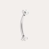 A curved Platinum PVD Crystal Titanium Rook Barbell with clear gem studs on both ends, shown against a plain light background.