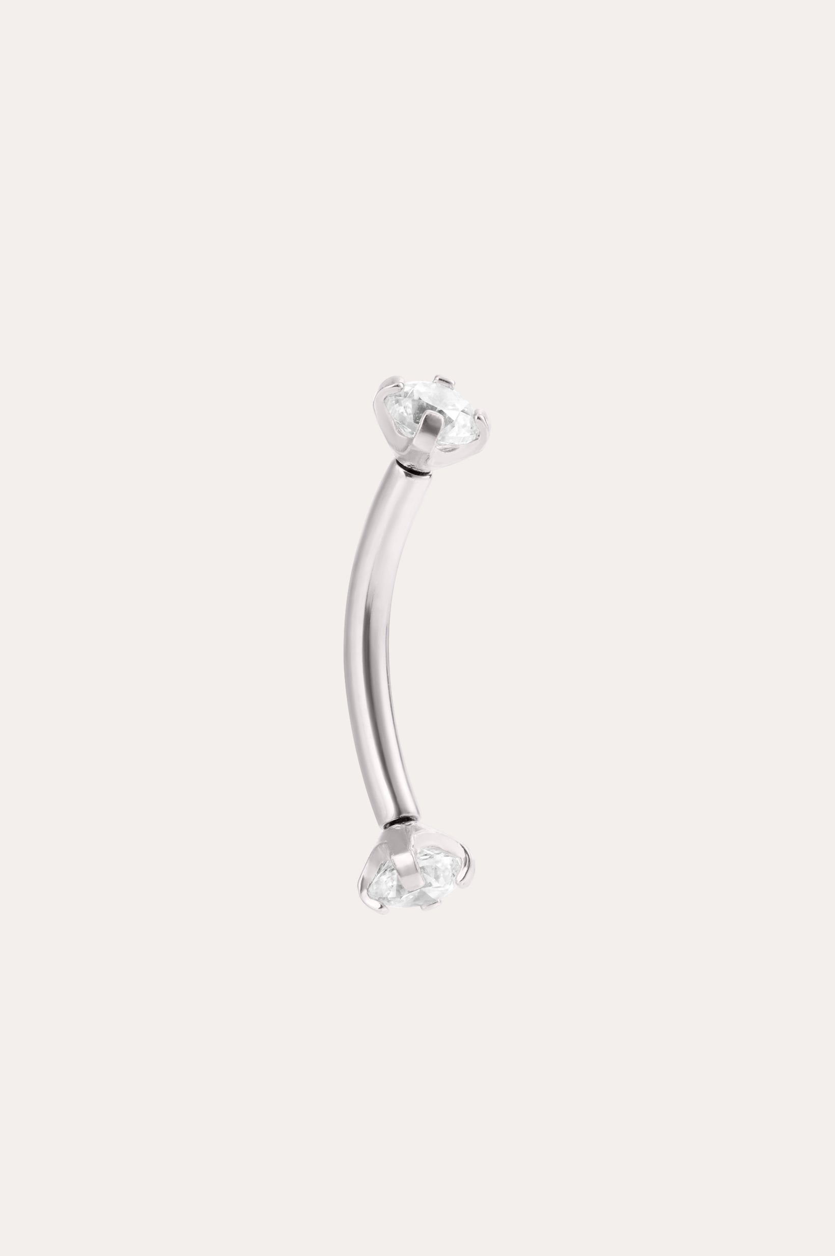 A curved Platinum PVD Crystal Titanium Rook Barbell with clear gem studs on both ends, shown against a plain light background.
