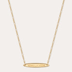 The Viva La Vida Bar Chain Necklace in Gold features an oval horizontal pendant engraved with VIVA LA VIDA on an adjustable delicate figaro chain for the perfect fit.