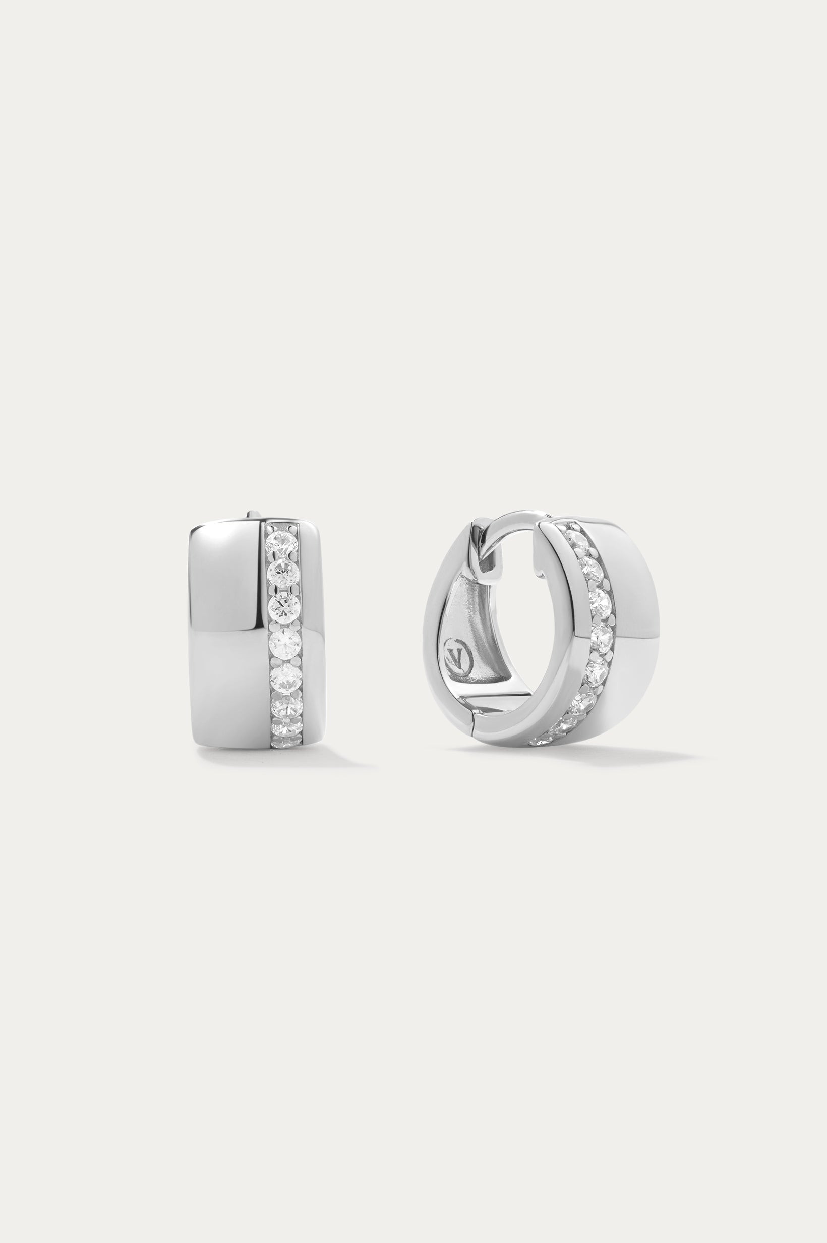 Juni Pavé Chunky Hoop Earrings in Silver: Sterling silver hoops with a vertical row of sparkling diamonds, shown against a plain white background.