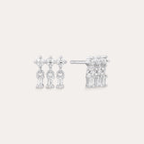 The Lexi Crystal Studs Earrings in Silver showcase three vertical rows of sparkling cubic zirconia in a geometric design, displayed on a neutral background.