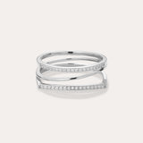 The Nola Pavé Triple Band Ring in Silver features three thin, parallel pavé bands set with sparkling white stones, connected at the sides and displayed on a plain light background.
