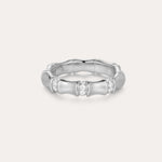 The Bamboo Chunky Crystal Ring in Silver is crafted from recycled sterling silver, featuring three sections set with sparkling crystals and a bamboo-inspired design, shown against a plain, light background.
