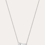 Silver necklace with a curved pendant on a light gray background