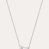 Silver necklace with a curved pendant on a light gray background