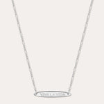 The Viva La Vida Bar Chain Necklace in Silver features a delicate, adjustable Figaro chain and an engraved oval horizontal bar pendant with VIVA LA VIDA in capitals, shown on a plain white background.