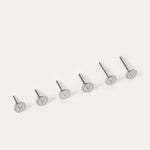 Six silver metal pins—Push-Pin Titanium Flatback Replacement Backings—are arranged in a row on a light background. Each flat circular top is engraved with a V symbol, highlighting the sleek craftsmanship of Vanchi titanium.