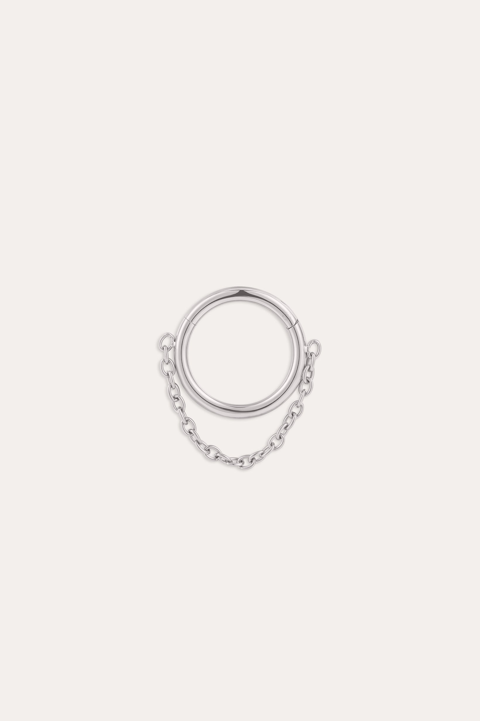 The Chain Clicker Titanium Ring in Platinum, featuring a platinum PVD hoop linked to a delicate chain, is elegantly showcased against a plain white background.