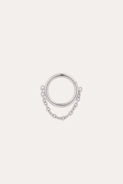 The Chain Clicker Titanium Ring in Platinum, featuring a platinum PVD hoop linked to a delicate chain, is elegantly showcased against a plain white background.