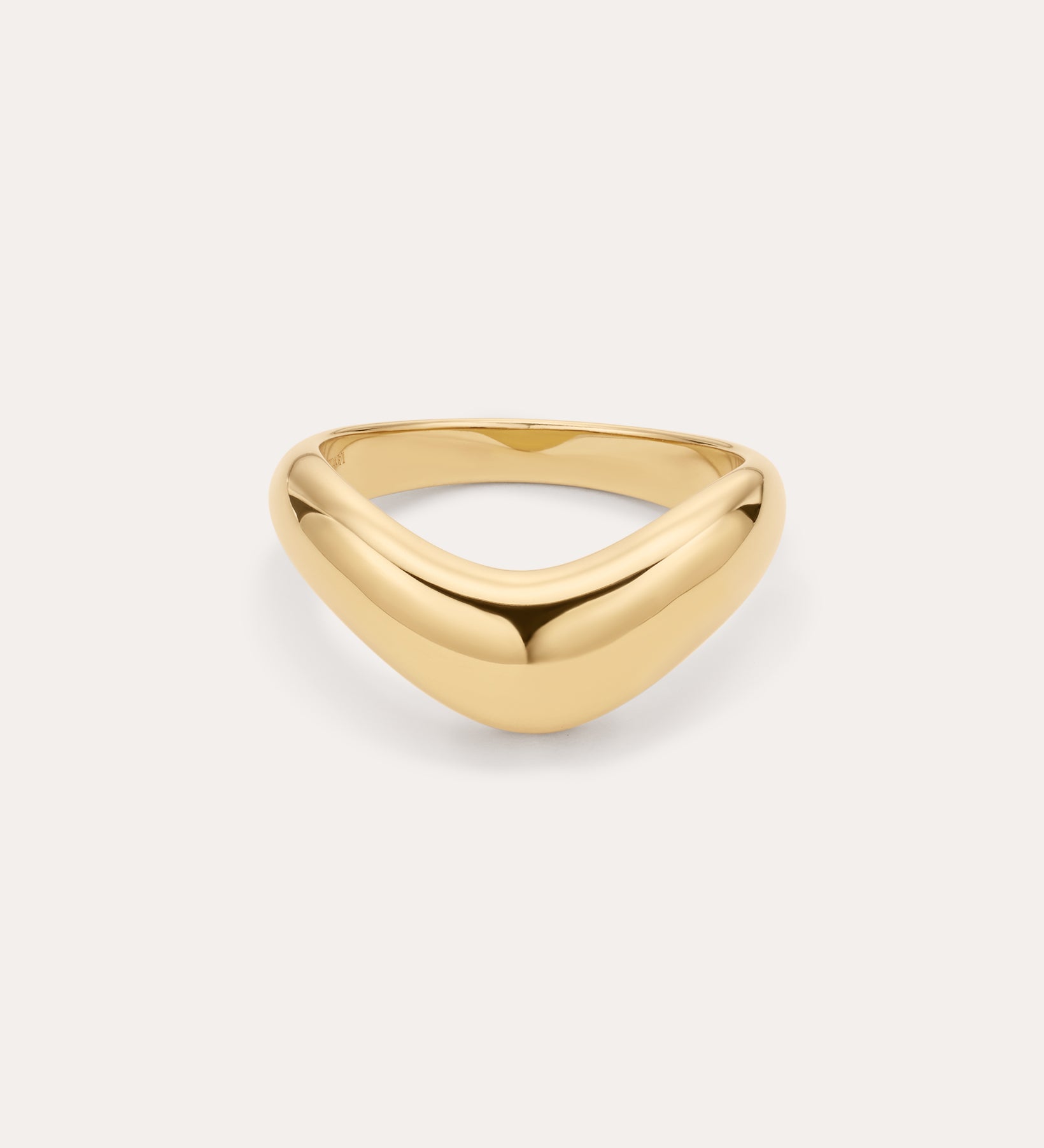 The Vava Plain Chunky Curved Wave Ring in Gold features a smooth, polished gold-plated finish with a minimalist, curved and slightly pointed front, showcased on a simple light background.