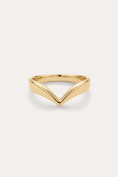 The Veda Plain Chevron Ring in Gold is a minimalist, gold-plated wishbone ring with a sleek V-shaped design, shown against a simple light background.