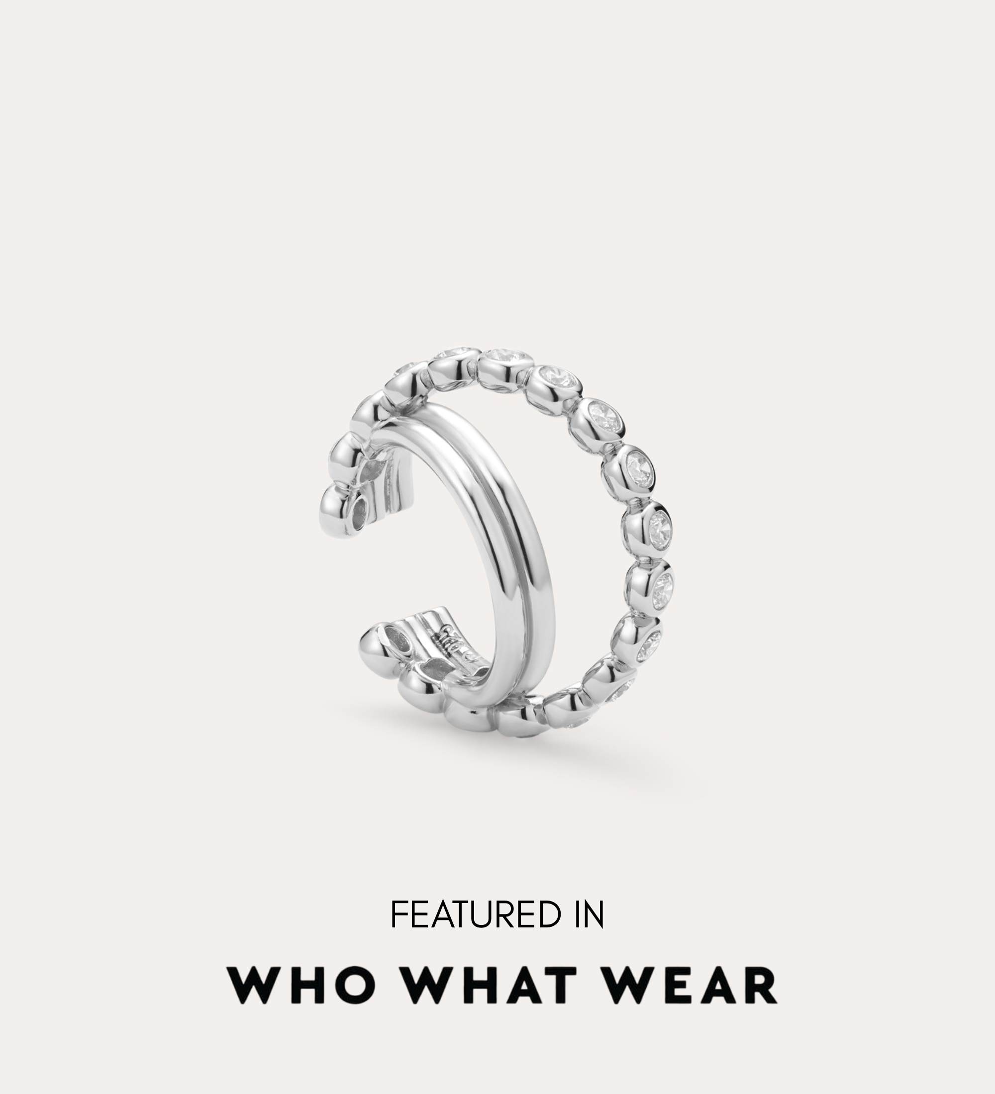 The Vina Crystal Bezel Ear Cuff in Silver, a non-pierced ear cuff with a beaded design, is shown on a light background and has been featured in Who What Wear.